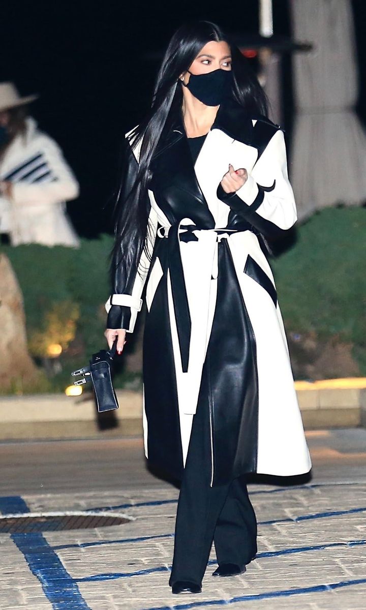 Kourtney Kardashian black and cream leather trench coat as she steps out to dinner