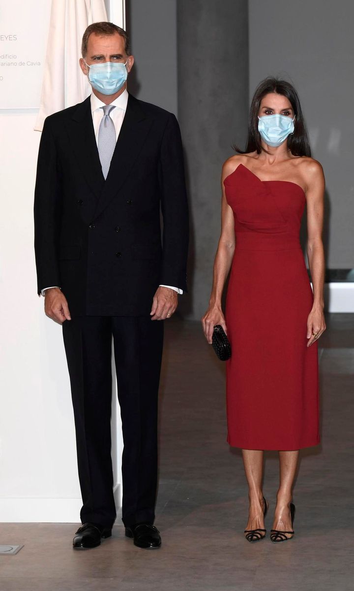 The royal couple sported matching face masks for the dinner in Madrid