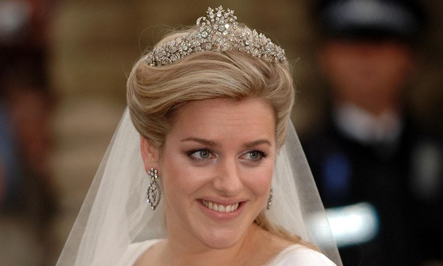 The bride wore a tiara belonging to Duchess Camilla's family anchoring her elegant upswept hairstyle.
Photo: Getty Images