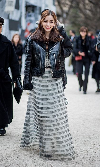 Chinese actress Angelababy rocked a leather jacket over a striped dress as she made her way to the shows.
Photo: Christian Vierig/Getty Images