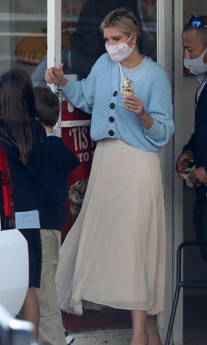 A sweet treat! Ivanka, wearing a baby blue cardigan, reportedly by Urban Outfitters, teamed with a pleated skirt, took her children to get ice cream.