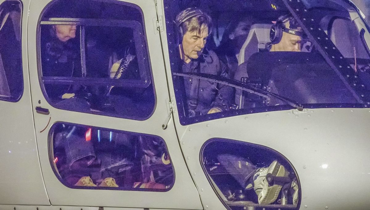 Tom Cruise piloting a helicopter in London