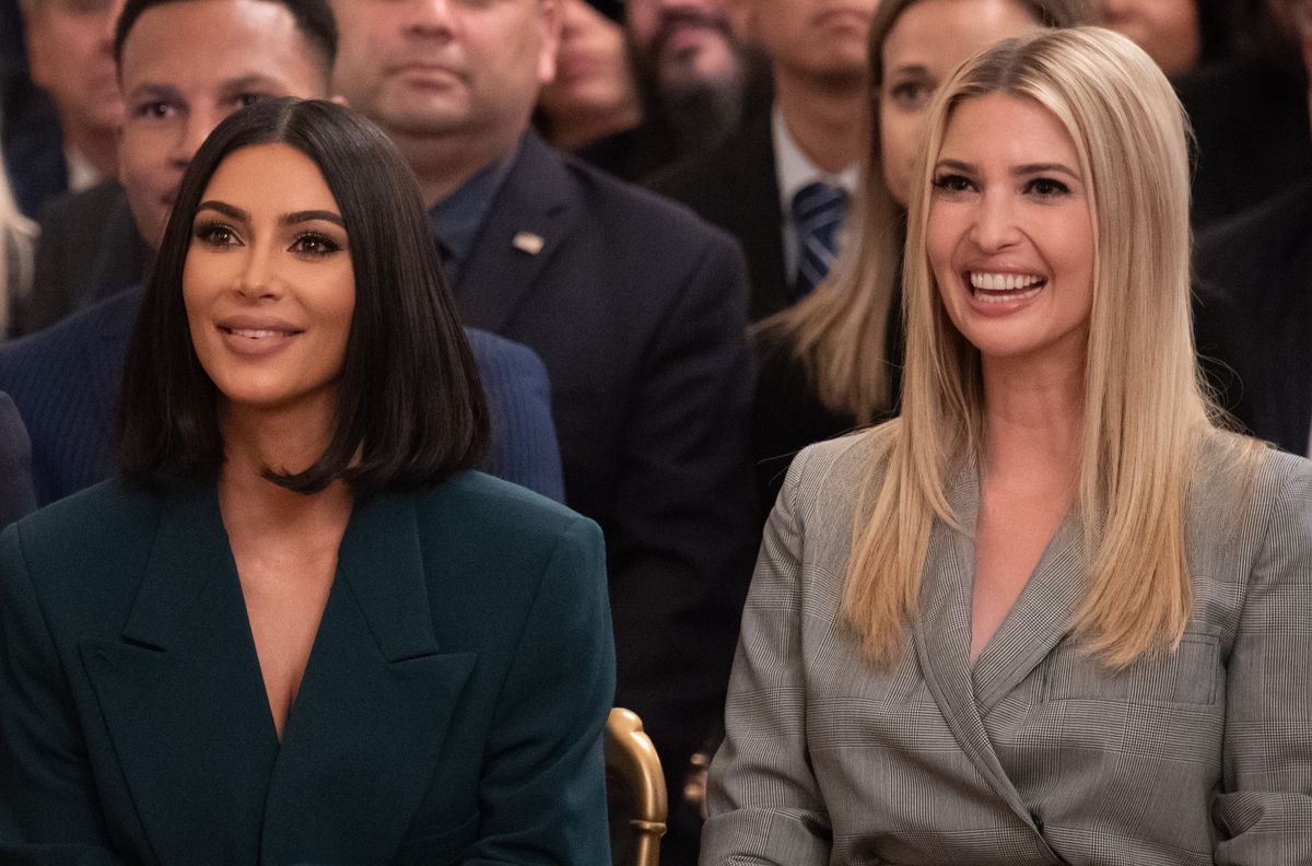 Kim Kardashian and Ivanka Trump listen as US President Donald Trump speaks at the White House 