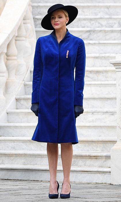 Monaco's National Day is one of the most highly-anticipated events of the year not least because of the amazing fashion! Prince Albert's wife Princess Charlene of Monaco donned a bespoke coat in cobalt blue velvet by one of her favorite labels, Akris. She finished off the look with a wide-brimmed hat and dark blue shoes and leather gloves.
Photo: Getty Images