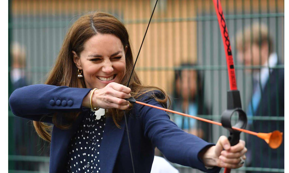 WOLVERHAMPTON, ENGLAND - MAY 13: Catherine, Duchess of Cambridge tries archery during a visit to The Way Youth Zone on May 13, 2021 in Wolverhampton, England. (Photo by Jacob King - WPA Pool/Getty Images)
