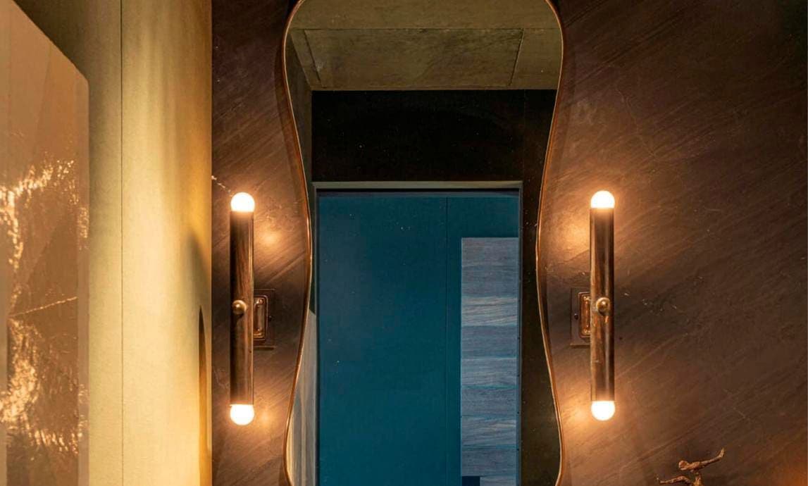 A dark and romantic bathroom in Ellen DeGeneres and Portia de Rossi's mansion they just sold.