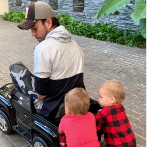 Enrique Iglesias and kids with toy car