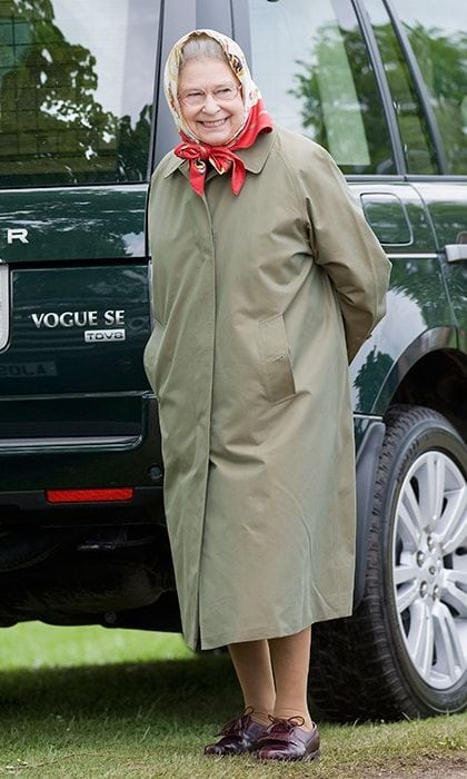 No one does English country casual like Her Majesty! A simple raincoat and signature scarf made the Queen look right at home alongside her Range Rover at the Royal Windsor Horse Show on May 16, 2009.
Photo: Marco Secchi/Getty Images