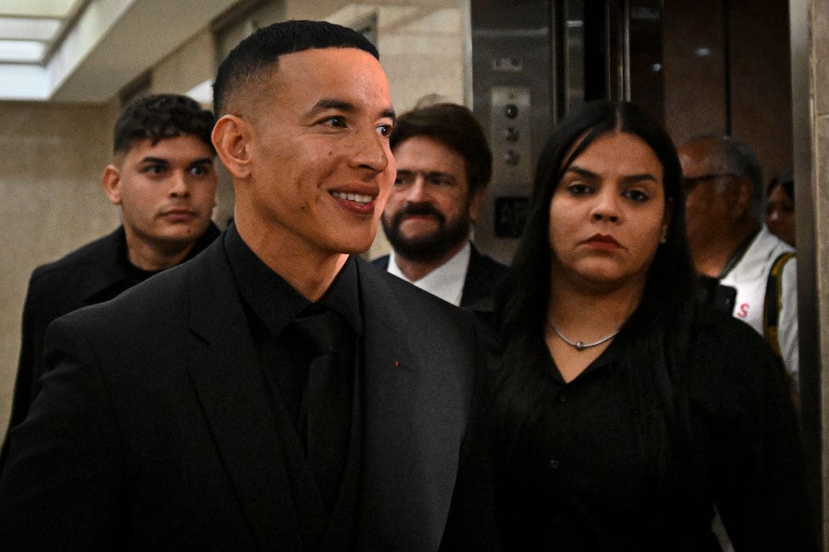  Daddy Yankee speaks to the media as he leaves the Puerto Rico Judicial Center following a hearing on December 20, 2024 in San Juan, Puerto Rico. Rapper Daddy Yankee appeared in court after filing a lawsuit against his ex-wife, Mireddys GonzÃ¡lez, claiming that she withdrew $100 million from company accounts without his authorization. (Photo by Miguel J. Rodriguez Carrillo/Getty Images)