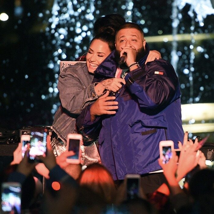 Demi Lovato and DJ Khaled had plenty of love to go around during their Fan Luv event held at The Grove in Los Angeles on November 2. The Disney alum alum performed her hit <i>Sorry Not Sorry</i>, while DJ Khaled treated fans to a performance of <i>Wild Thoughts</i>. The pair's entrance to the event, which celebrated their tour, included a marching band, double decker trolley, and Rolls-Royce.
Photo: Kevin Winter/Getty Images