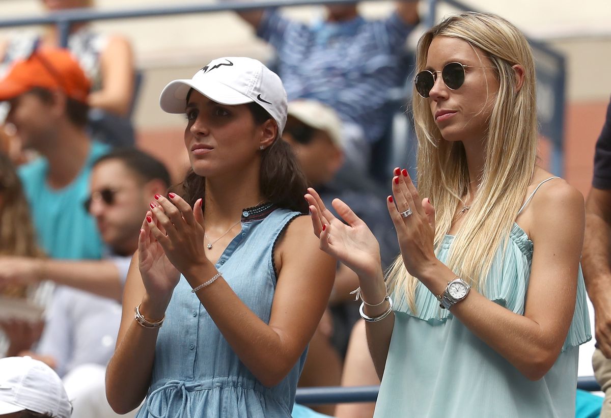     Girlfriend Xisca Perello and sister Maria Isabel Nadal of Rafael Nadal of Spain celebrate his victory during his men's singles fourth round match against Nikoloz Basilashvili of Georgia on day seven of the 2018 US Open at the USTA Billie Jean King National Tennis Center on September 2, 2018 in the District Flushing in the New York borough of Queens. (Photo by Julian Finney/Getty Images)