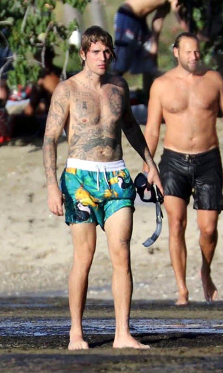 Justin Bieber shows off growing tattoo collection while snorkeling in Hawaii