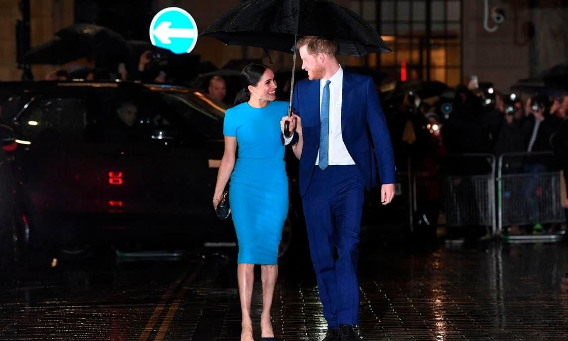 Meghan Markle and Prince Harry color coordinate for one of their final royal engagements