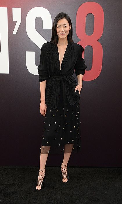 Supermodel Liu Wen was chic in a pleated jacket and embellished skirt by Jason Wu.
Photo: WENN