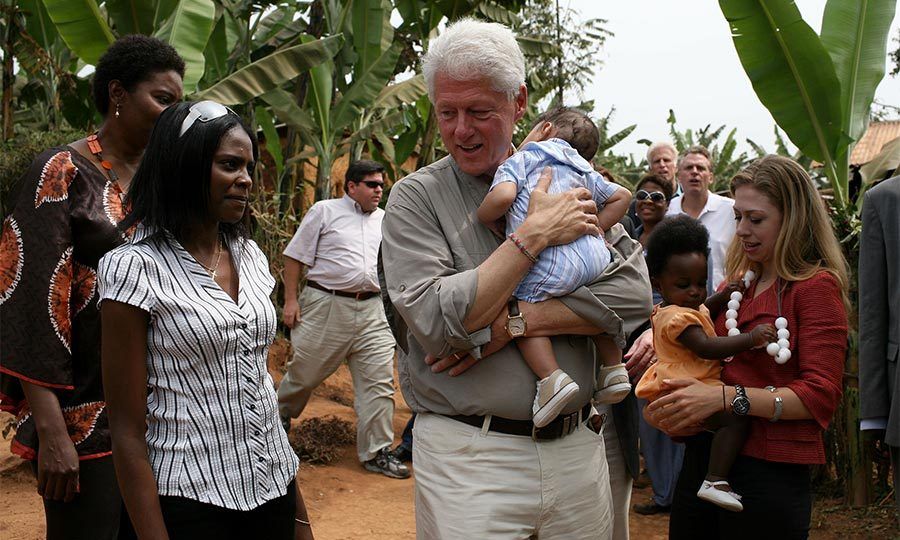 Chelsea showed off her maternal side as she cradled small children during a trip to a rural healthcare clinic in Rwanda with her father.
Photo: Getty Images