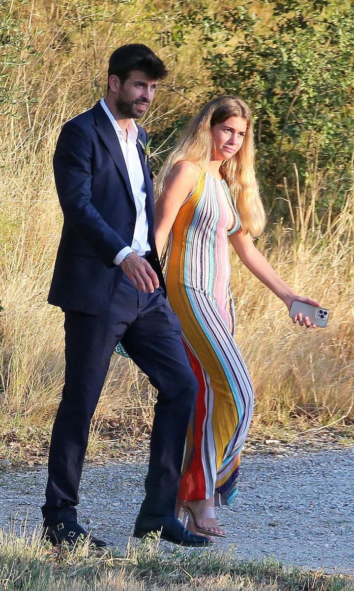 Gerard Pique and Clara Chía attend a wedding as dates