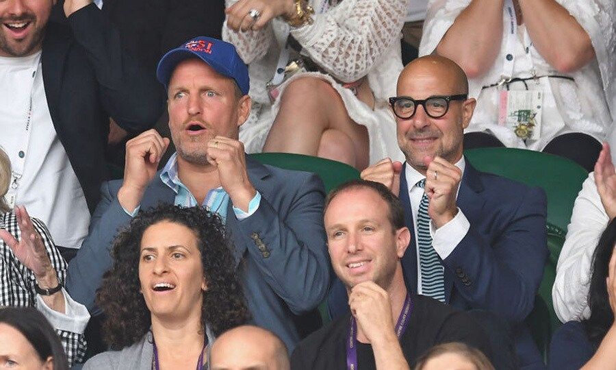 <i>Hunger Games</i> co-stars Woody Harrelson and Stanley Tucci had the same reaction as they watched Venus Williams against Garbine Muguruza in the finals.
Photo: WireImage