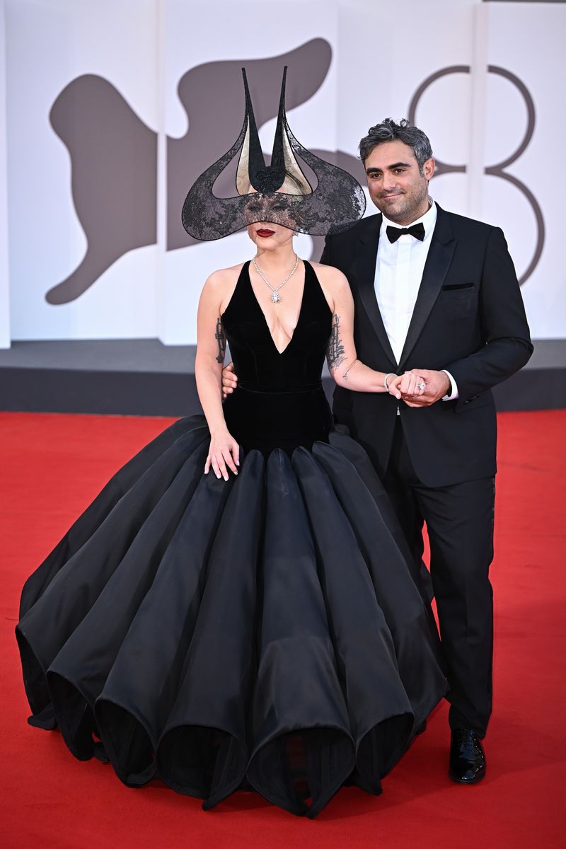 Lady Gaga and Michael Polansky attend the "Joker: Folie A Deux" photocall during the 81st Venice International Film Festival at Palazzo del Casino 