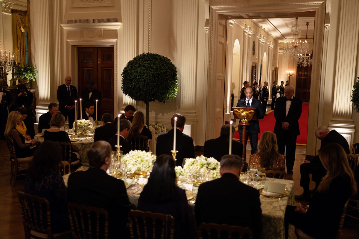 Scott Turner, U.S. Secretary of Housing and Urban Development (HUD), prays alongside U.S. President Donald Trump during the National Governors Association Evening Dinner and Reception in the East Room of the White House on February 22, 2025 in Washington, DC. Trump is hosting the governors in Washington for the annual National Governors Association meetings. 