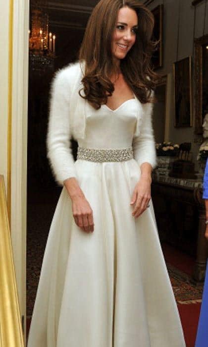 Burton again captures the simplicity and elegance of Kate with this minimalist gown for the reception following the wedding.
<br>
Photo: Getty Images