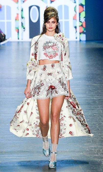 Victoria's Secret model Taylor Hill worked the runway of the Anna Sui show modeling printed shorts paired with a matching overcoat.
Photo: Peter White/Getty Images