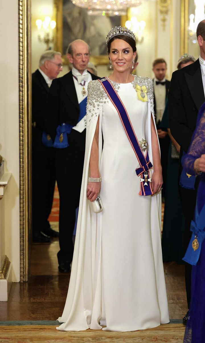 Catherine made her tiara debut as the Princess of Wales at a state banquet held at Buckingham Palace for South African President Cyril Ramaphosa in November. The Princess wore a Jenny Packham gown and the Queen Mary's Lover's Knot tiara for the occasion.