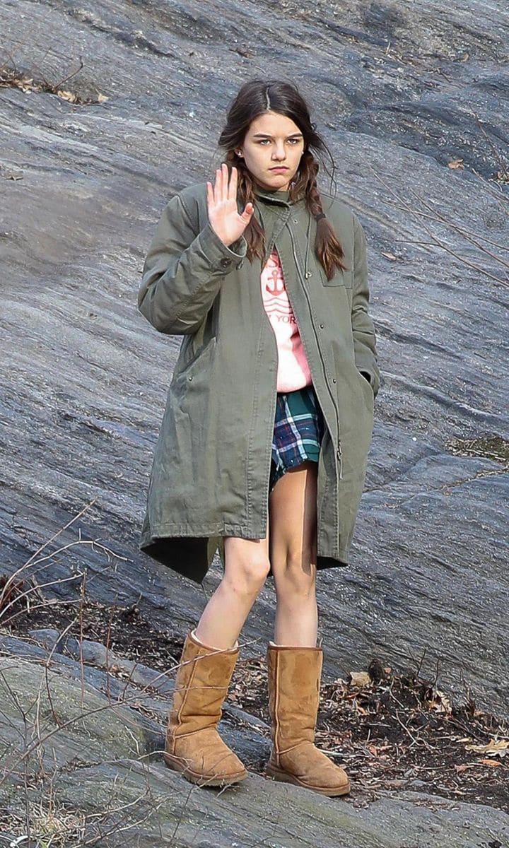 Suri Cruise in a trench coat