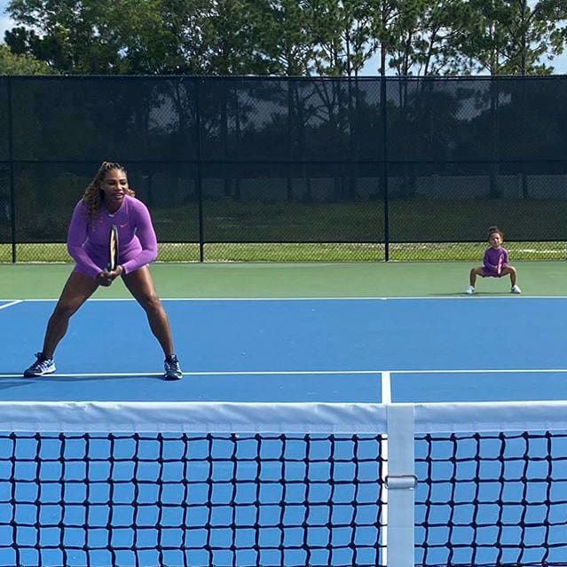 Serena Williams and her daughter hit the tennis court sporting matching purple outfits and stances