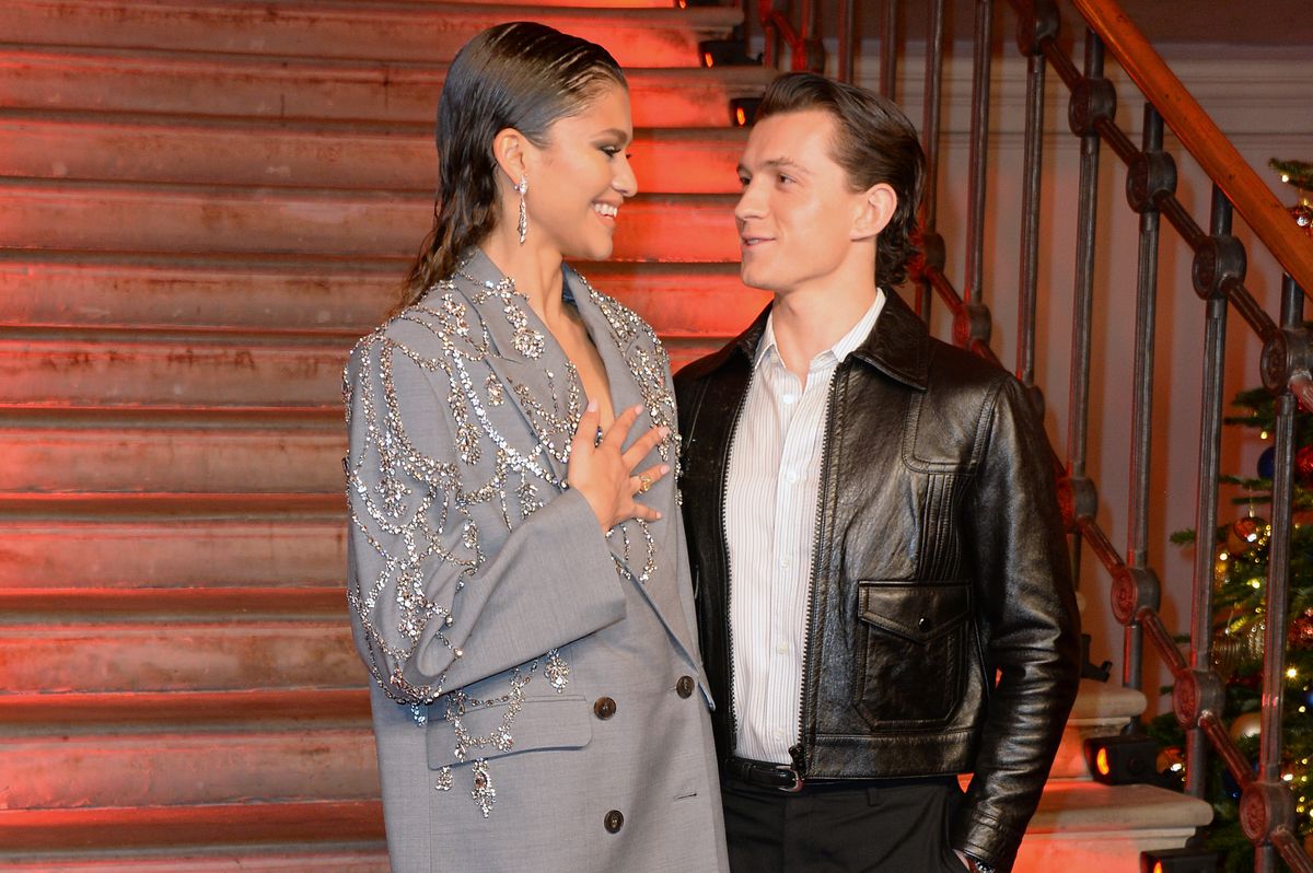 Zendaya and Tom Holland pose at a photocall for "Spider-Man: No Way Home" 