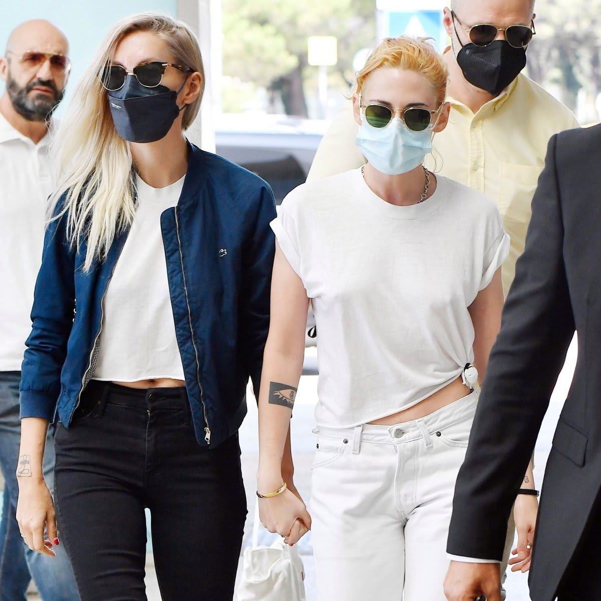 Kristen Stewart holds hands with Dylan Meyer at the 2021 Venice Film Festival