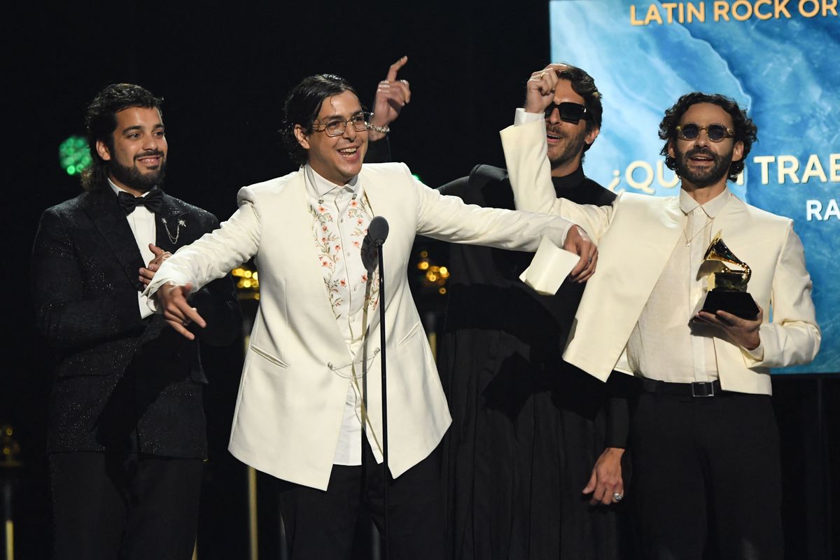 Venezuelan band Rawayana celebrate winning the Grammy for Latin Rock or Alternative Album "Â¿QuiÃ©n trae las cornetas?" during the 67th Annual Grammy Awards pre-telecast show at the Crypto.com Arena in Los Angeles on February 2, 2025. (Photo by VALERIE MACON / AFP) / RESTRICTED TO EDITORIAL USE (Photo by VALERIE MACON/AFP via Getty Images)          