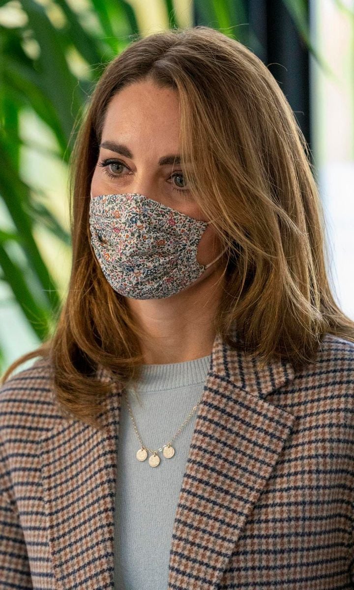 The Duchess of Cambridge debuted a new floral face mask for the campus visit