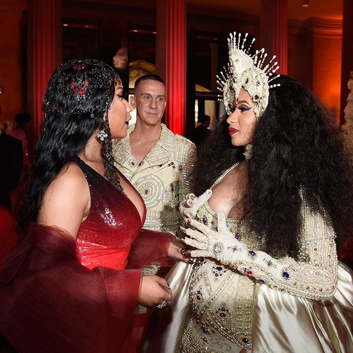 Designer Jeremy Scott looked on as Nicki Minaj, left, and pregnant Cardi B were deep in conversation at the Metropolitan Museum of Art fundraising gala.
Photo: Kevin Mazur/MG18/Getty Images for The Met Museum/Vogue