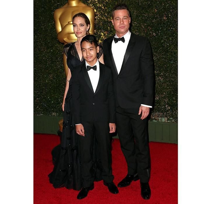 Wearing a cool tuxedo, Maddox enjoyed a golden night out with his mother and father at the Academy of Motion Picture Arts and Sciences' Governors Awards, held at the at The Ray Dolby Ballroom in Hollywood in November 2013.