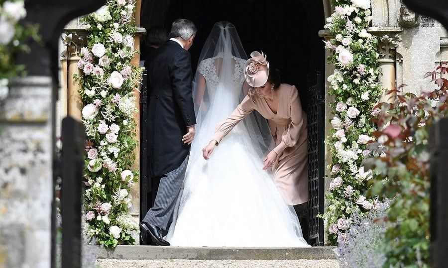 Usually the center of attention, Duchess Kate played a discreet role at Pippa's nuptials in Englefield, England in 2017, and was spotted helping adjust her little sister's train before the big walk down the aisle.
Photo: Getty Images