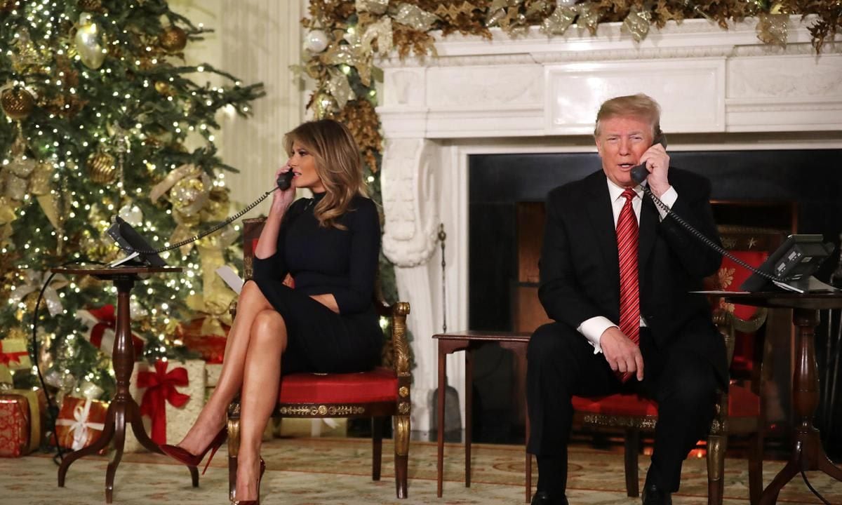 The President And First Lady Assist NORAD With Santa Tracker Phone Calls