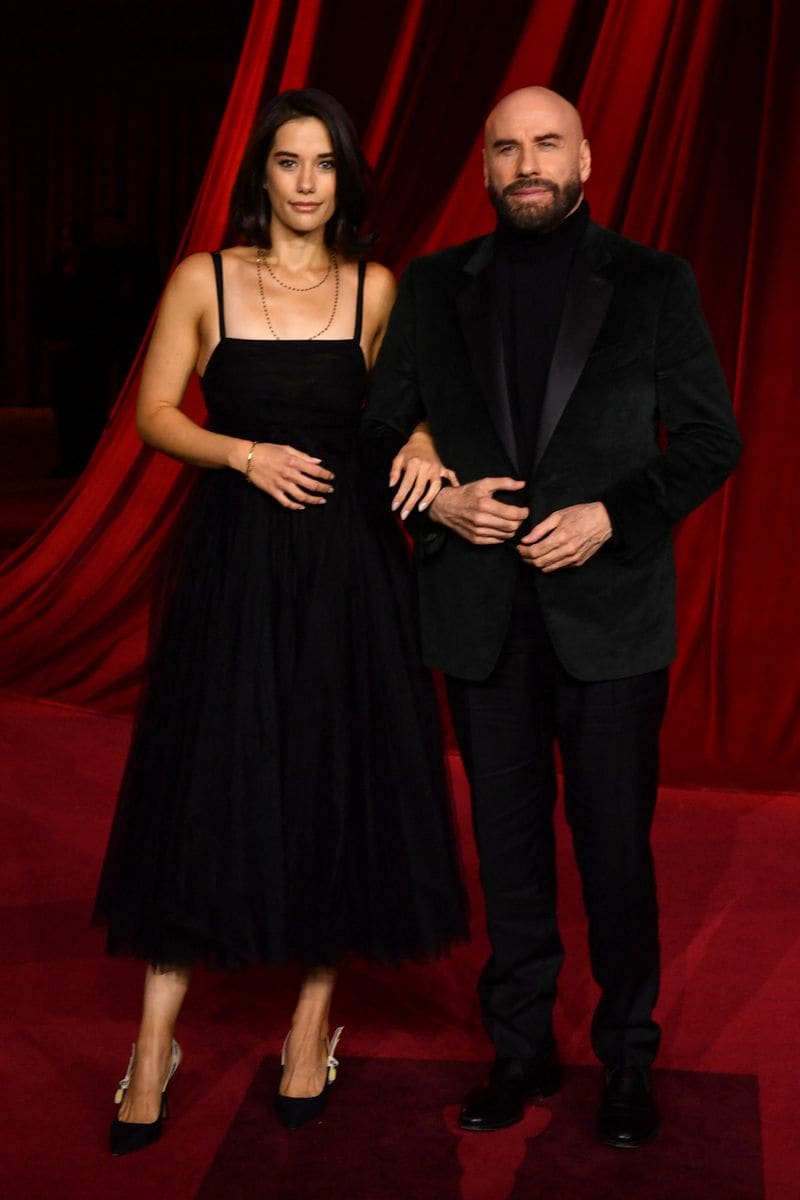 US actor John Travolta (R) and Ella Bleu Travolta arrive for the 4th Annual Academy Museum Gala at the Academy Museum of Motion Pictures in Los Angeles, October 19, 2024. (Photo by Valerie Macon / AFP) (Photo by VALERIE MACON/AFP via Getty Images)