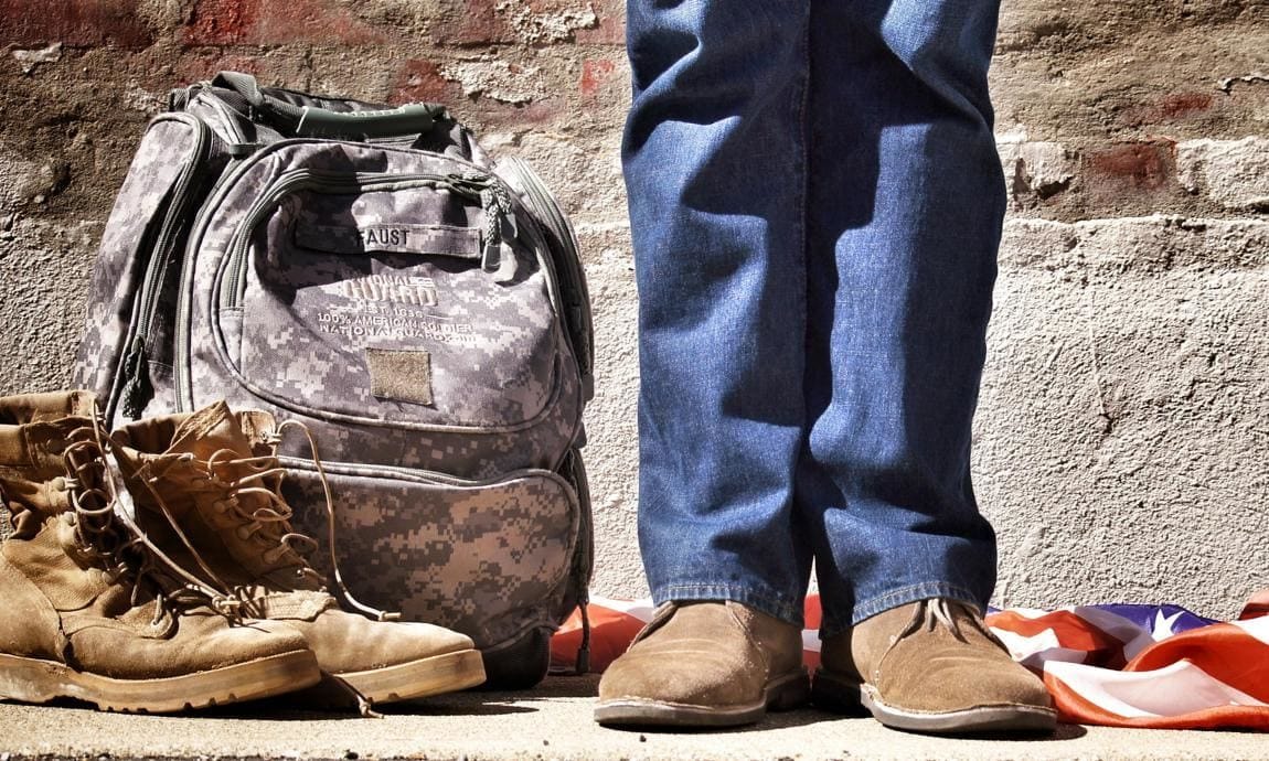 Veteran gear and United States flag.