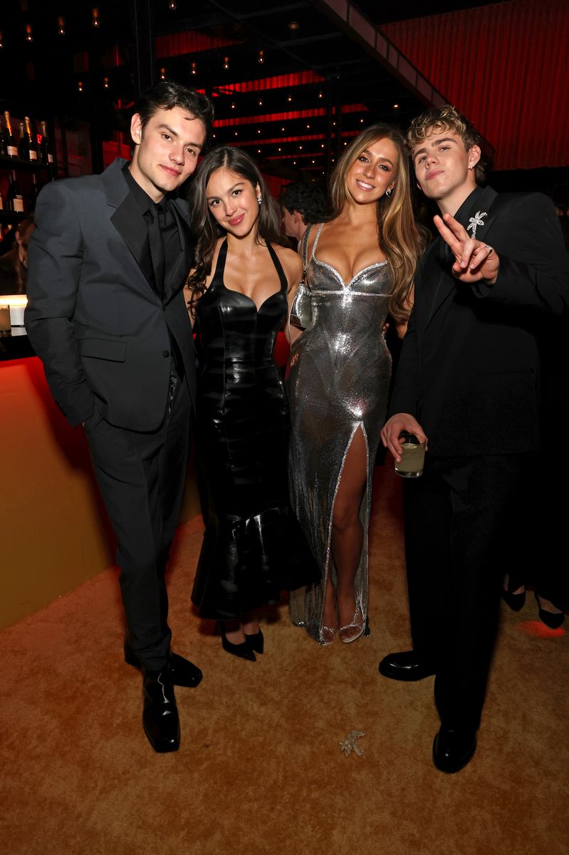 Louis Partridge, Olivia Rodrigo, Tate McRae and The Kid LAROI attend the 2025 Vanity Fair Oscar Party 