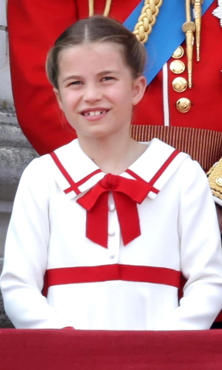 Charlotte complemented her brothers' ties wearing a red and white sailor-inspired dress.