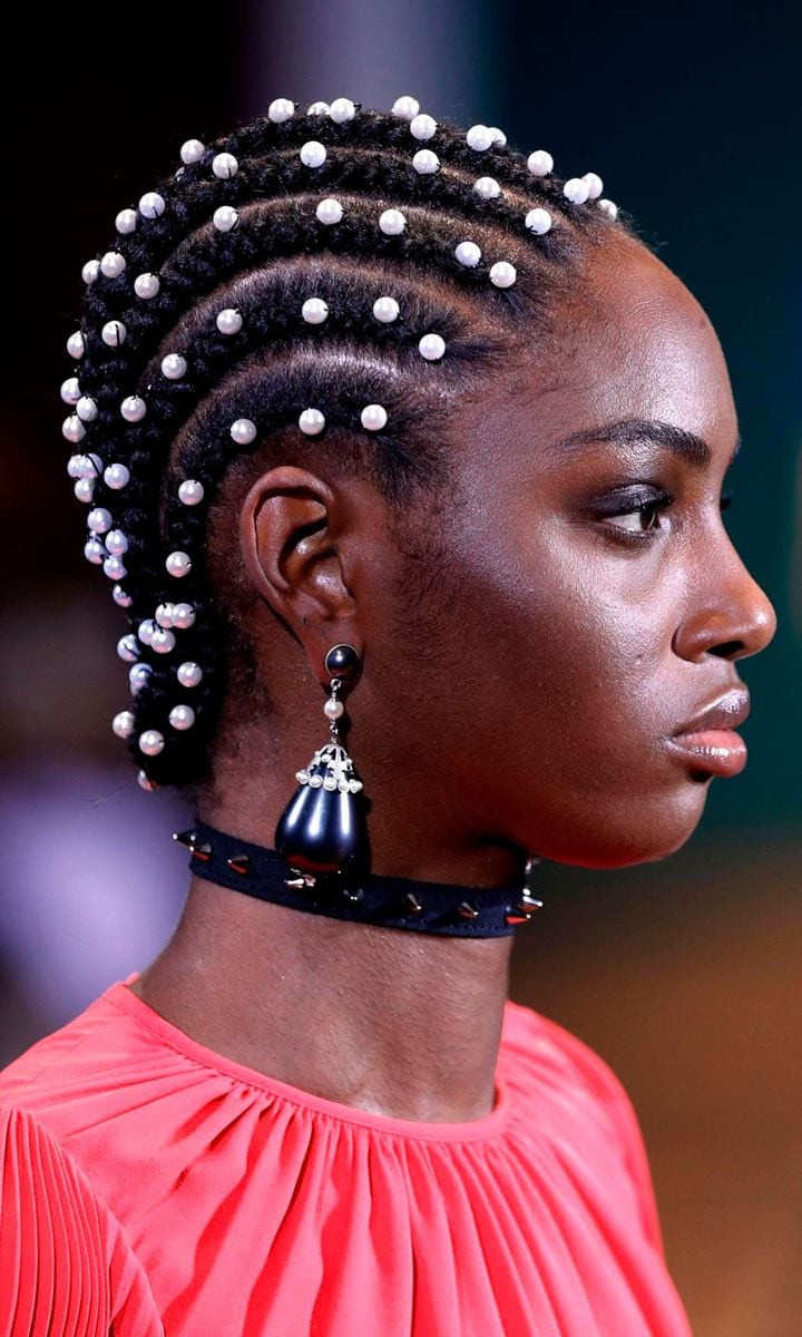 Andrew Gn model wears pearls in her hair