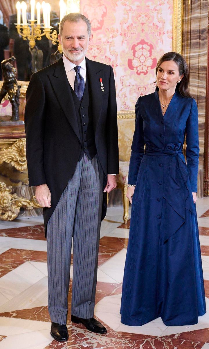 The Spanish Queen looked elegant in a navy shirt gown at the reception on Jan. 31