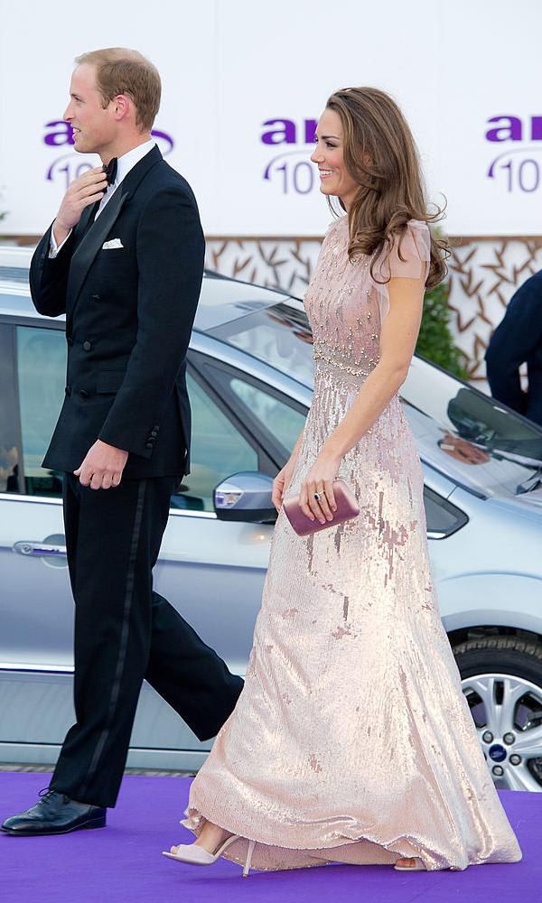 Kate Middleton in a Jenny Packham sequinned dress with transparent sleeves