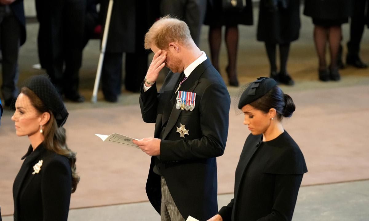 Harry was seen rubbing his eye at Westminster Hall.