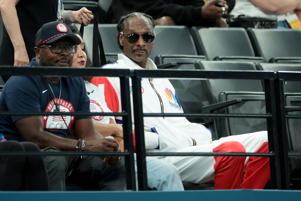 Snoop Dog attends day two of the Paris 2024 Olympic Games at the artistic gymnastics event with Simone Biles of the USA at Paris Arena on July 28, 2024, in Paris, France. 