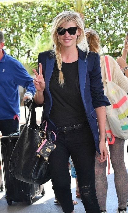 Peace, love, Cannes. Lara Stone kept it effortlessly cool at the Hotel Martinez rocking a side braid and blue blazer.
<br>
Photo: GC Images