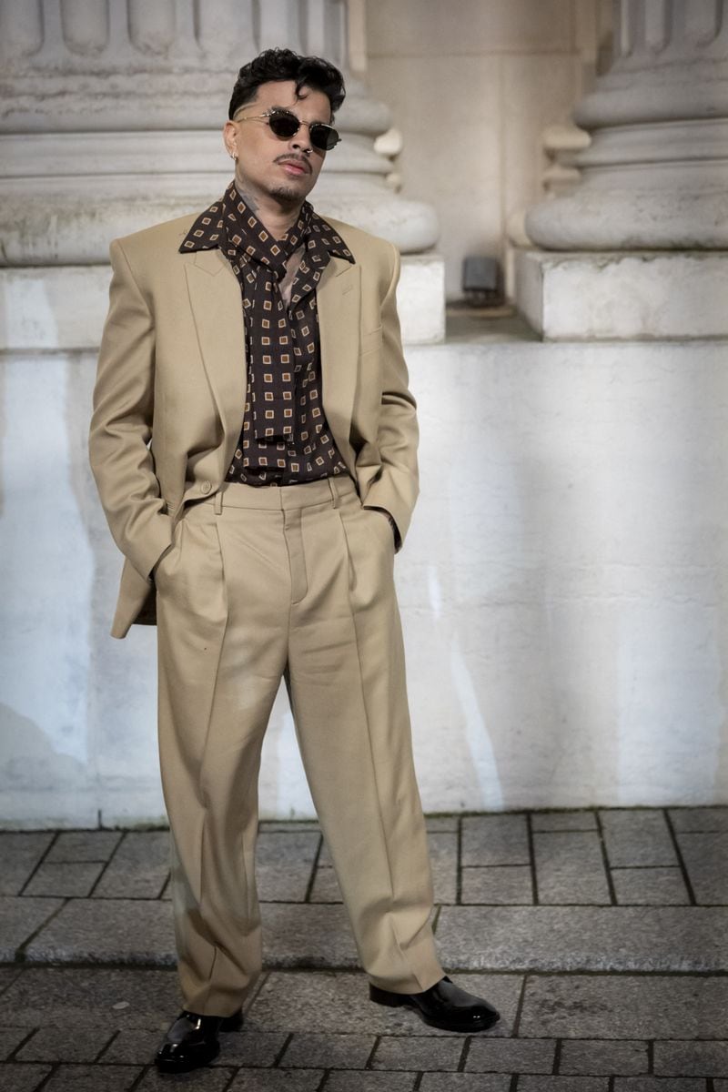 Rauw Alejandro at the Photo Call for the Saint Laurent men's show during Paris Fashion Week.