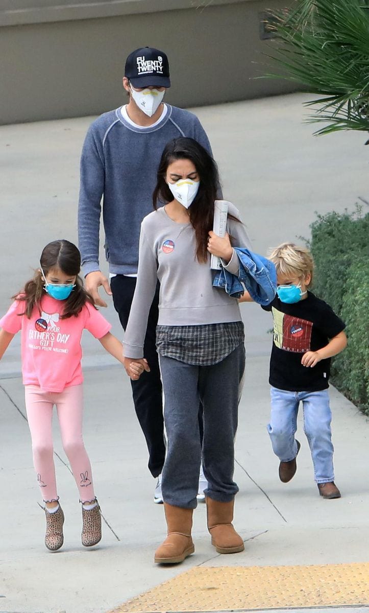 Mila Kunis and Ashton Kutcher voting