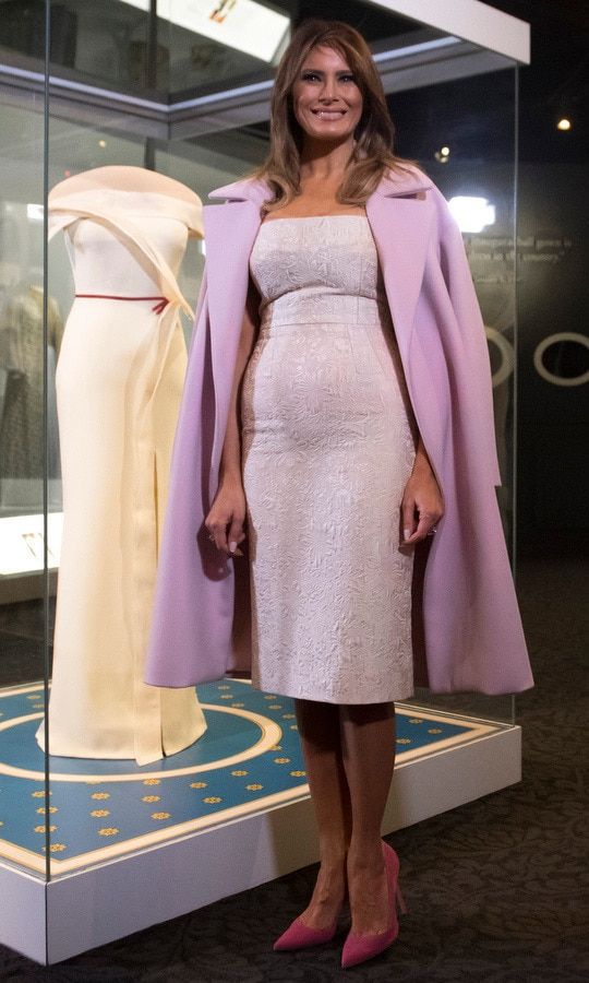 Melania wore a trio of her wardrobe staples pointy-toed stilettos, a tailored dress and coat worn over her shoulders as she unveiled the exhibition of her Herve Pierre Inaugural Ball gown as part of the First Ladies Collection at the Smithsonian National Museum of American History in Washington, DC.
Photo credit: SAUL LOEB/AFP/Getty Images