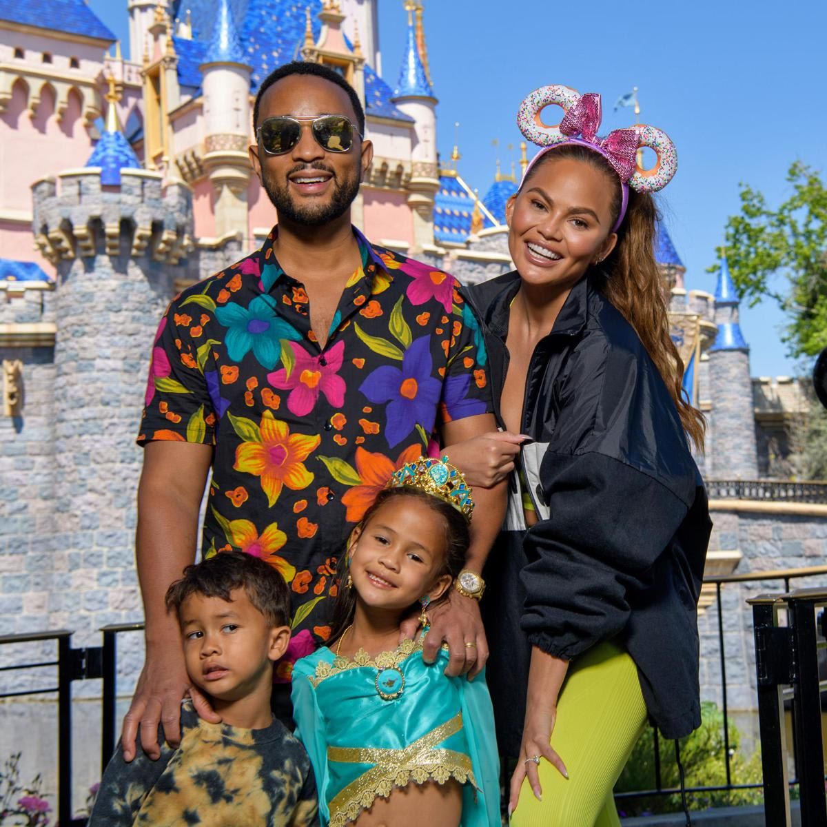 Chrissy Teigen And John Legend Visit Disneyland Resort in Anaheim, California